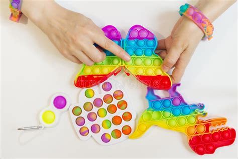 POP it Fidget Toy Antistress Stock Photo - Image of finger, dinosaur ...