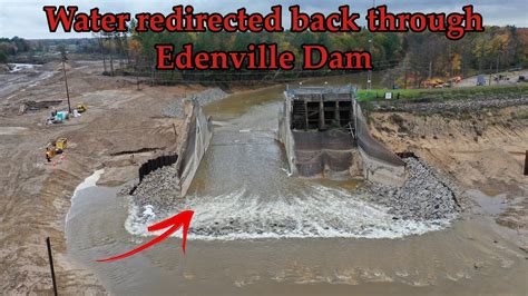 Water Flowing Back Through Edenville Dam Draining The New River Path And Removing The Plug