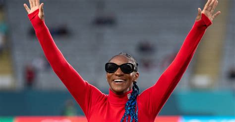 USWNT Member Crystal Dunn Winds Down By The Ocean In Tropical Neon Bikini And Matching Wrap