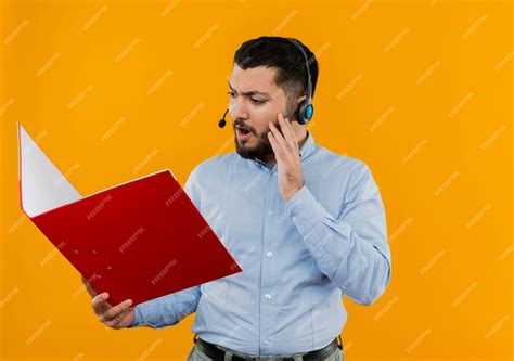 Free Photo Young Bearded Man In Glasses And Blue Shirt With