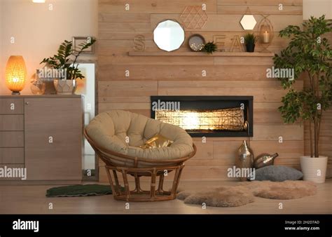 Cozy Living Room Interior With Comfortable Papasan Chair And Decorative