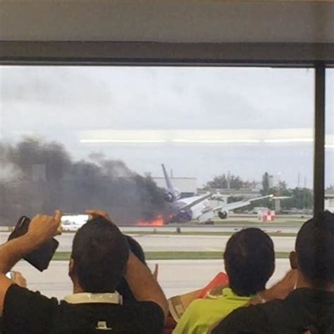 Americans Airlines Passengers Evacuated After Flight Bursts Into Flames