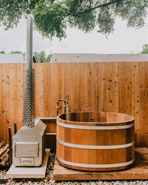 14 Outdoor Soaking Tubs That Will Make You Want One In Your Own Yard