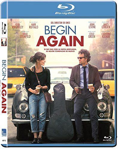 The Movie Begin Again Is Shown With Two People Sitting In Front Of An