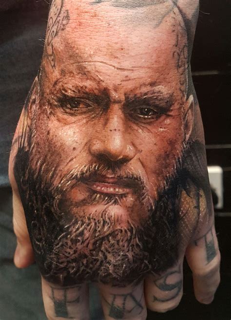 Ragnar Lothbrok Tattoos Awesome black and grey realistic morphing ...