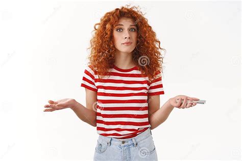 Clueless Perplexed Cute Redhead Stylish Curly Haired Girl Shrugging