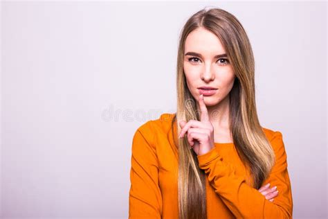 Blonde Girl In Orange T Shirt With Silence Gesture On White Stock Photo Image Of Long Orange