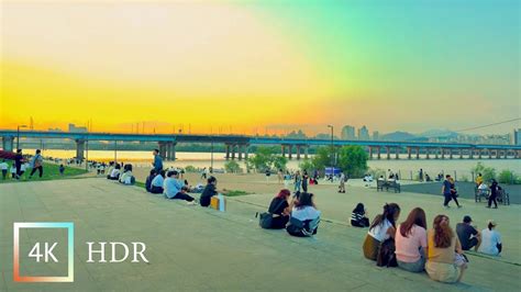 Sunset Flows Along The Water Of The Seoul Hangang Park Walking Tour