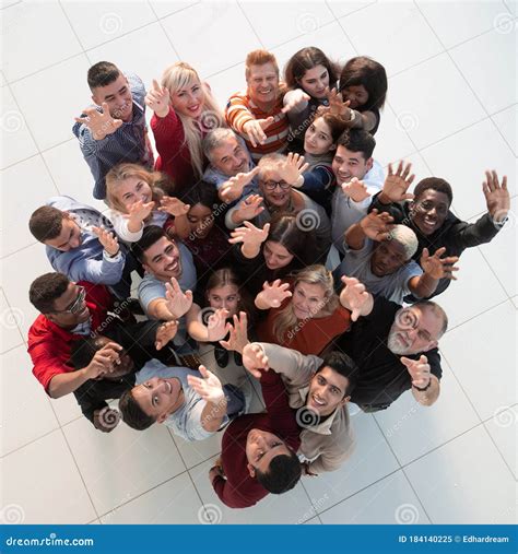 Multiethnic Group Of People Standing Together With Hands Up Stock Image