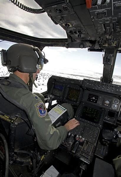 Pilot Of A Cv Osprey Goes Over His Instruments In