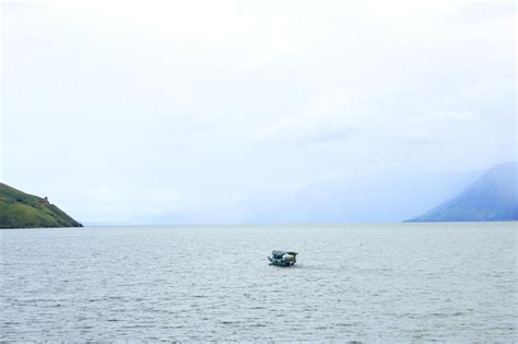 Premium Photo Boat On Lake Toba North Sumatra Indonesian