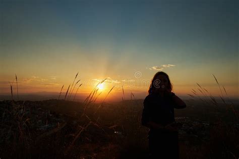 Silhouette of a Girl at Sunset Stock Image - Image of relaxation, adult ...