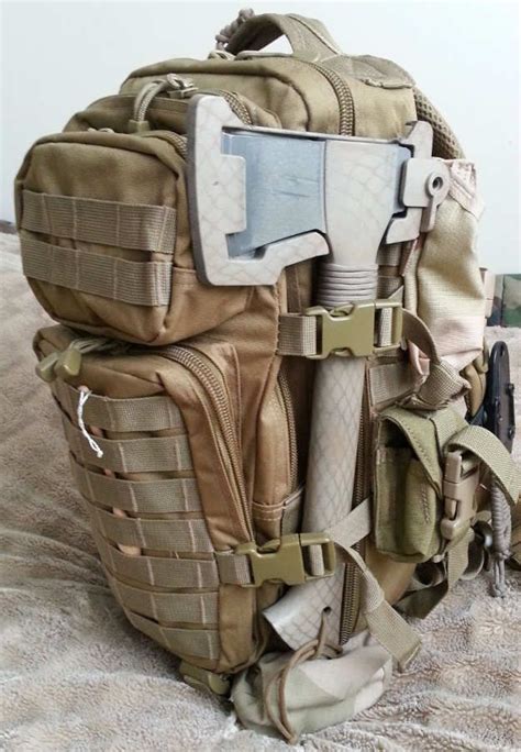 a large backpack with multiple items attached to the front and back ...