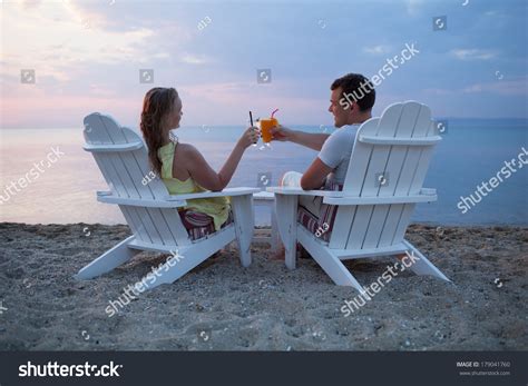 Romantic Couple Sitting Wooden Deckchairs On Stock Photo 179041760