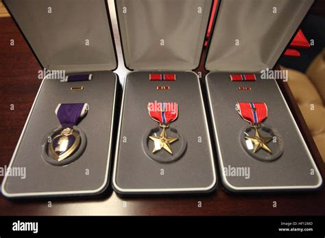 A Purple Heart And Two Bronze Star Medals Are Displayed At U S Marine