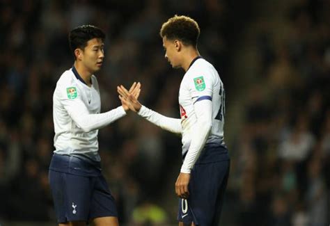 Dele Alli Of Tottenham Hotspur Celebrates With Team Mate Heungmin Son After Scoring Their First