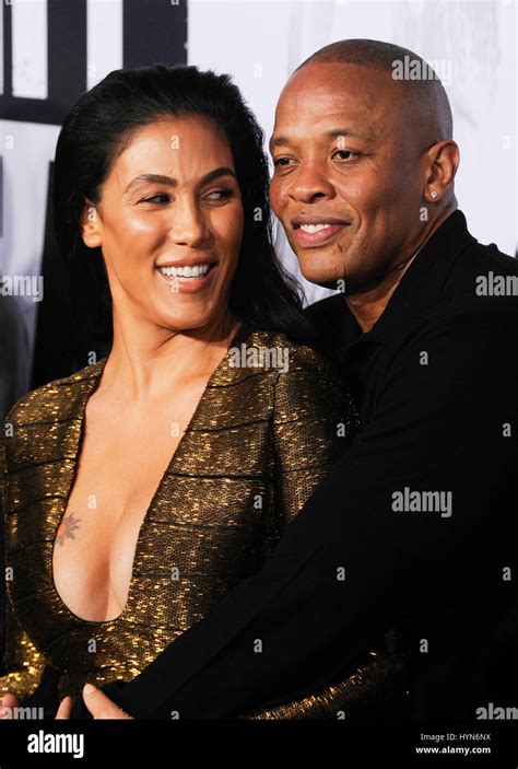 Dr Dre And Wife Nicole Threatt Attend The Straight Outta Compton Stock