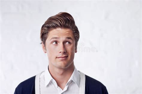 Confused Man Thinking And Why Face In Studio White Background And