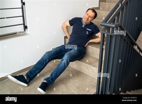 Man Falling Down Stairs High Resolution Stock Photography And Images