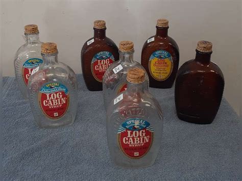 7 Vintage Glass Log Cabin Syrup Bottles Northern Kentucky Auction LLC