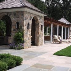 Backyard With Large Stone Patio and Pergola | Patio stones, Outdoor ...