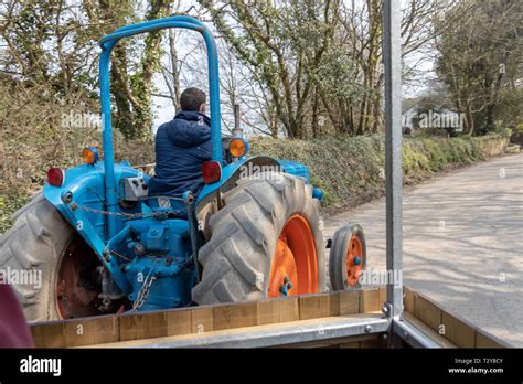 Tractor farm tour of the Orchards at Healeys Cyder Farm Stock Photo - Alamy