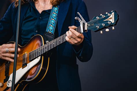 Shallow Focus Photo Of Person Playing Electric Guitar · Free Stock Photo