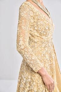 Buy Gold Net Embroidered Floral Plunge V Neck Jacket Lehenga Set For