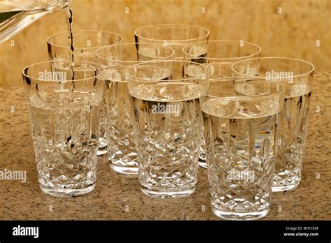 Eight glasses of water Stock Photo - Alamy