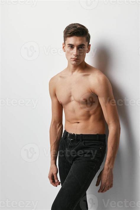 Handsome Guy Nude Torso Black Pants Light Background Model 22074900