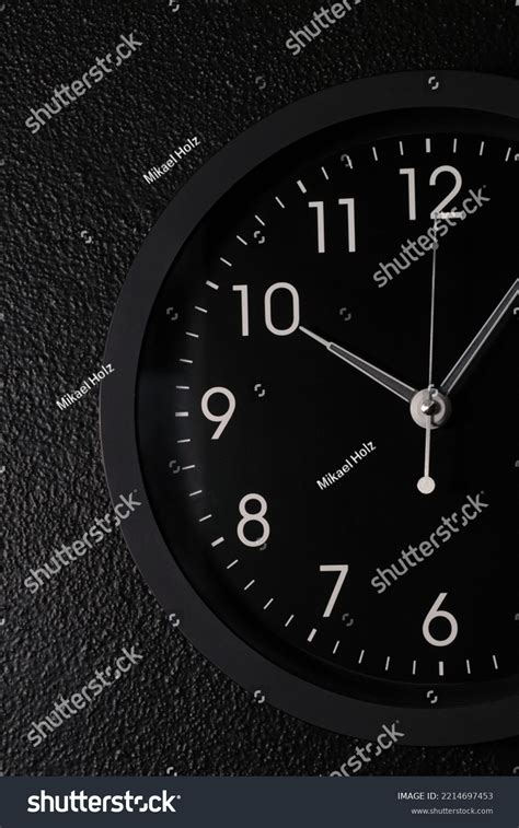 Black Modern Clock Hanging On Black Stock Photo 2214697453 Shutterstock