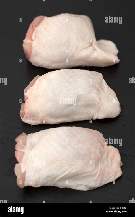 Raw Chicken Thighs Stock Photo - Alamy