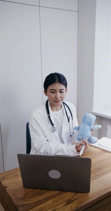 A Doctor Having Online Consultation on Her Laptop · Free Stock Video