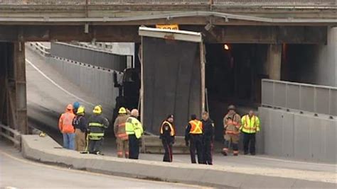 Dump Truck Hits Bridge Rips Off Box Cbc News