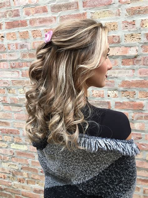 Curly half up half down styles are taking over social media 16