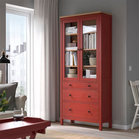 HEMNES Glass Door Cabinet With 3 Drawers Red Stained Light Brown