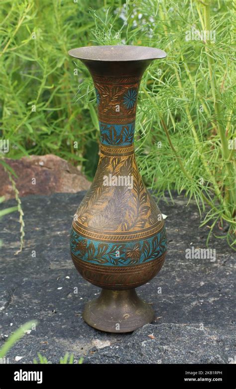 Antique Indian Copper Vase On The Stone Stock Photo Alamy