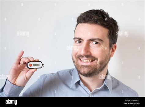 Man Holding A Security Banking Pin Generator Stock Photo Alamy