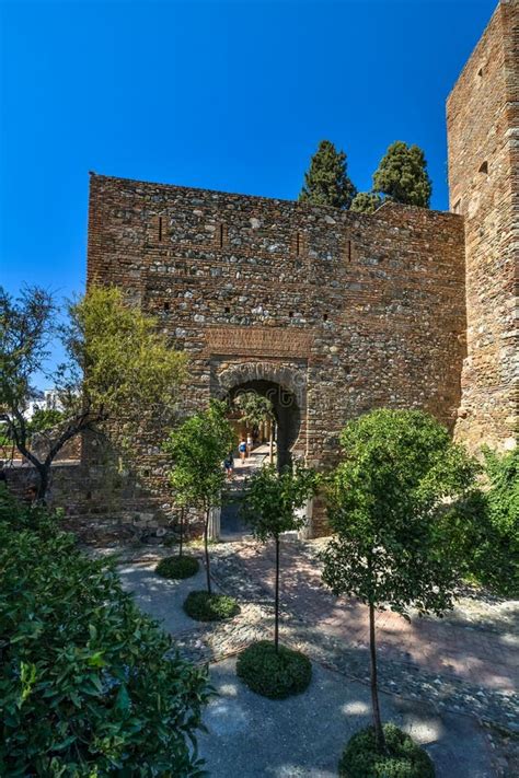 Tourist Enjoying the Gardens of the Alcazaba Arab Castle in Malaga ...