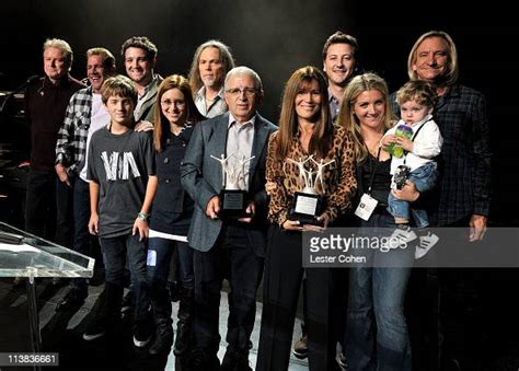 Shelli Azoff and Irving Azoff and the Azoff family pose for a... News ...