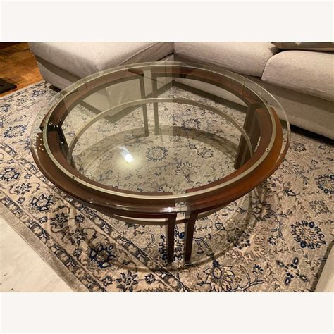 Round Glass Top Cherry Wood Coffee Table - AptDeco