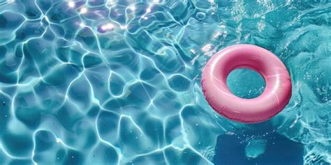 Premium Photo A Pink Inflatable Float In A Blue Water With The Words