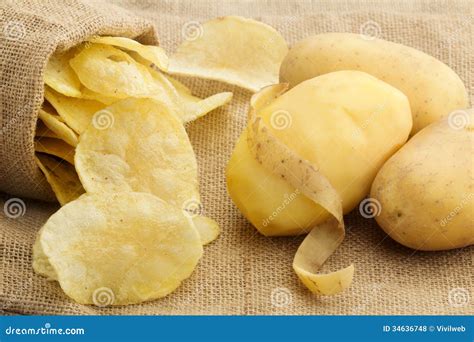 Chips and peeled potato stock photo. Image of burlap - 34636748