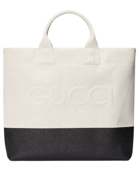 Gucci Logo Embossed Canvas Tote Bag Farfetch