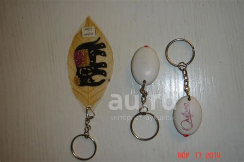 Новые брелки новые два с фонариком и один зарубежный сувенирный "Слон ...