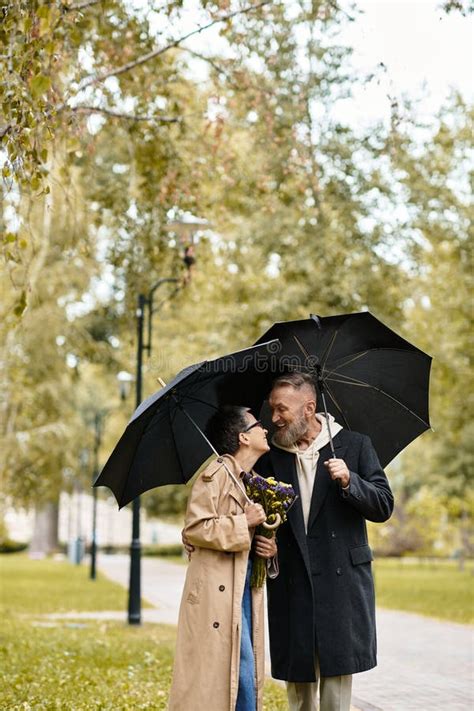 Mature Couple Sharing A Tender Moment Stock Image Image Of Greenery Moments 362834039