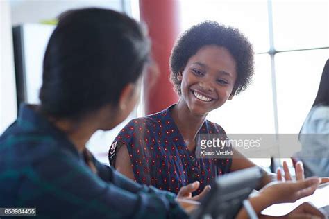 575 University Students Laughing Together In Classroom Stock Photos ...