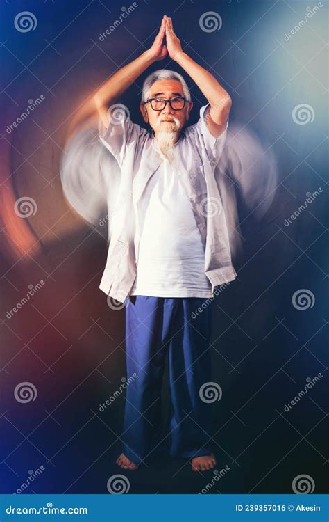 Asian Old Man In Traditional Chinese Dress Practice Chinese Tai Chi