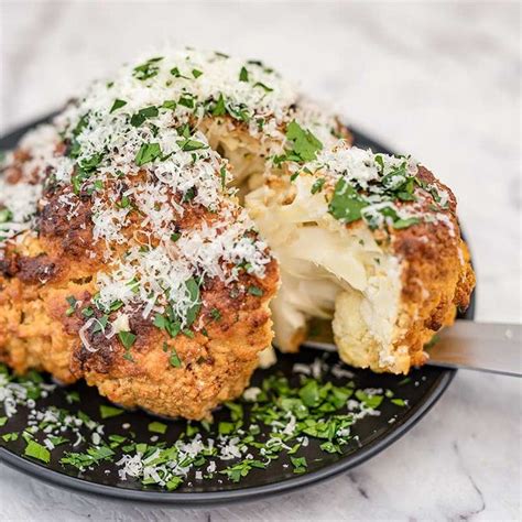 Whole Roasted Cauliflower Baked With Garlic And Cheese Recipe Whole Roasted Cauliflower