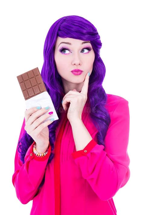 Woman With Purple Hair Holding Chocolate And Thinking About Some Stock